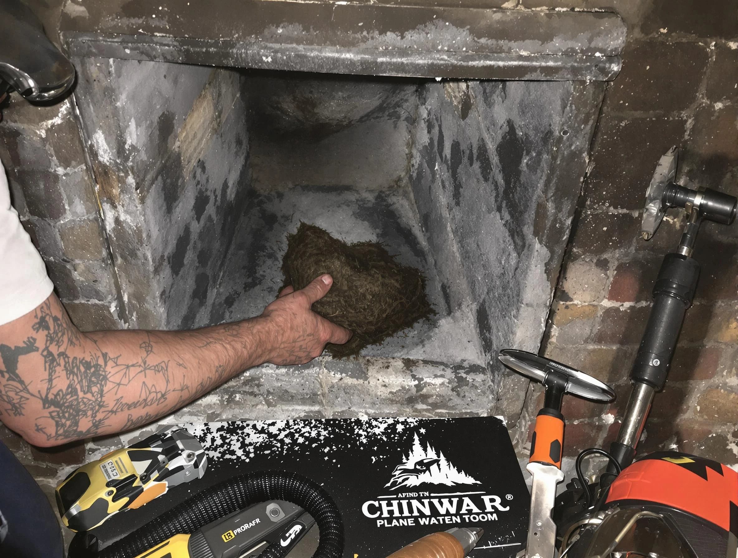 Hempfield Chimney Sweep safely removing debris and screening chimney in Hempfield, PA
